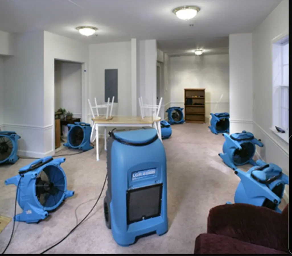 Air movers and dehumidifier setup for Water Extraction & Removal in Rochester